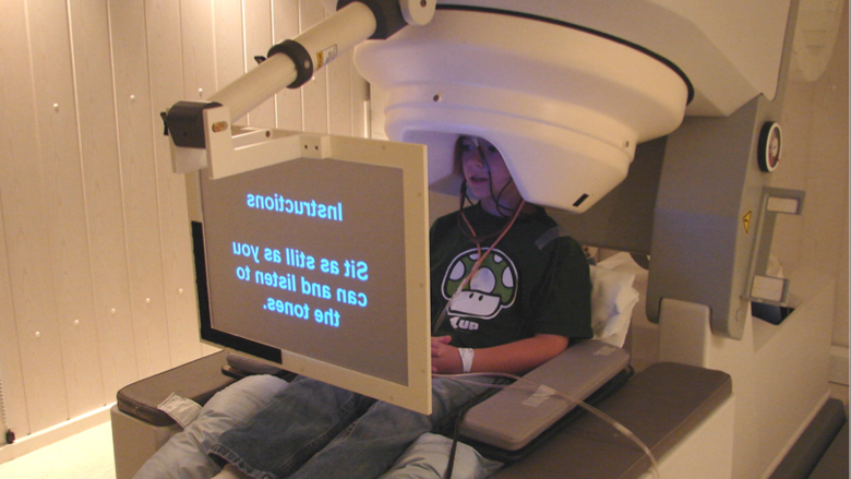 boy in MEG machine
