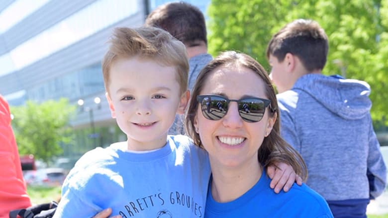 Mother and son smiling at a CHOP fundraising event