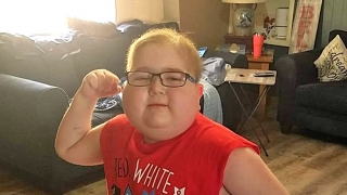 Jacob posing and flexing his muscle