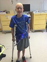 Cameron on crutches