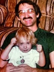 Marla as a baby with her father