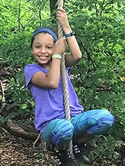 Isabella on a rope swing