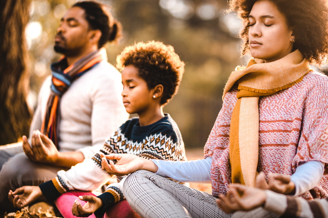 Family doing yoga
