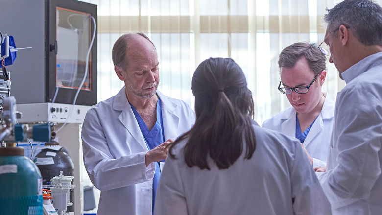 Fetal doctors talking in lab