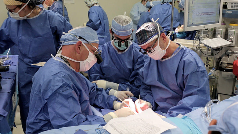 Surgeons Performing Hand Transplant Surgery