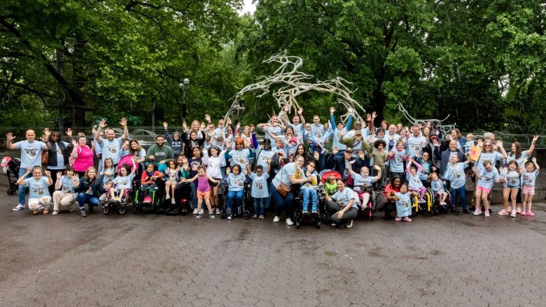 large group photo of families and staff at CHOP CTIS reunion