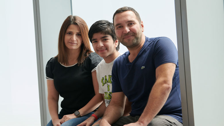 Family sitting in window