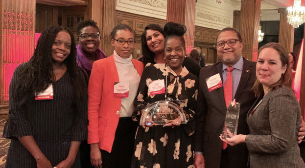 Group of people after receiving awards