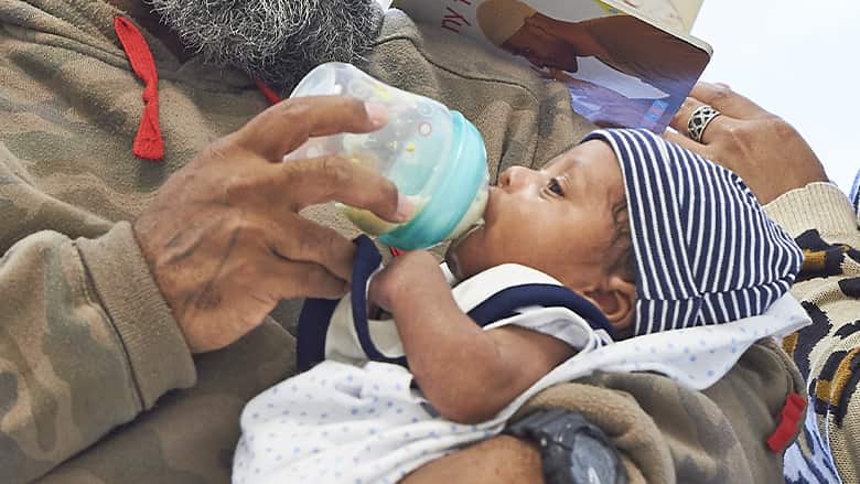 Baby drinking from bottle