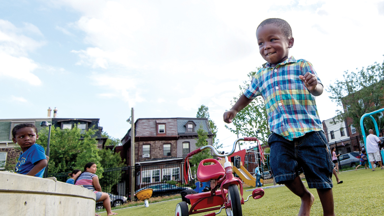 young boy playing outside