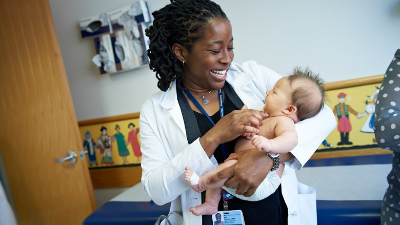 CHOP Doctor with healthy baby