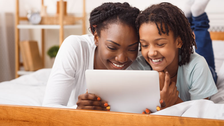 mom and daughter making video call mom and daughter making video call