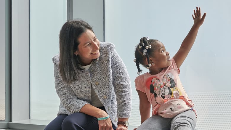 Dr. De León with a patient