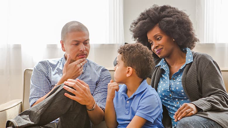 Parents talking with their child