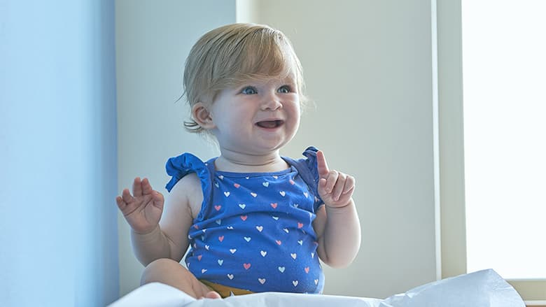 Baby smiling in doctor's office Baby smiling in doctor's office