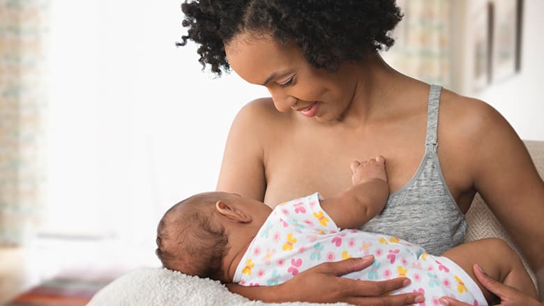 Mother breastfeeding infant