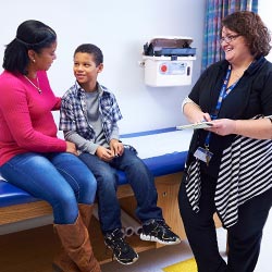 Mom with son in exam room