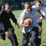 Kids playing football