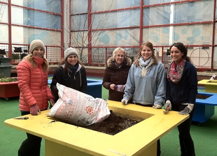 Child Life and Occupational Therapy staff work in the Sea Garden at Children's Seashore House.
