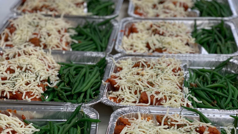food in metal trays food in metal trays