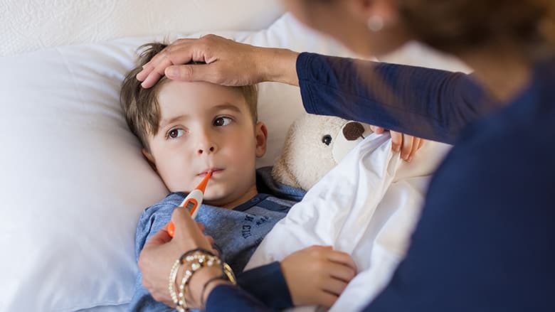 Sick child being cared for