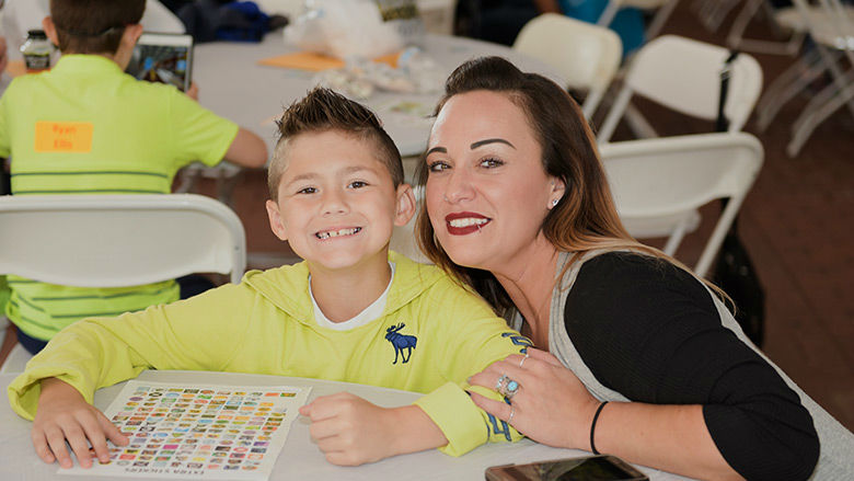 Mother and son smiling