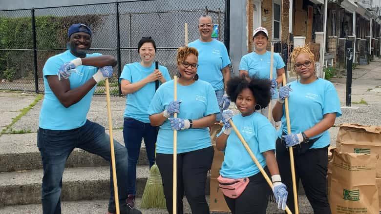 Photo of team cleaning streets