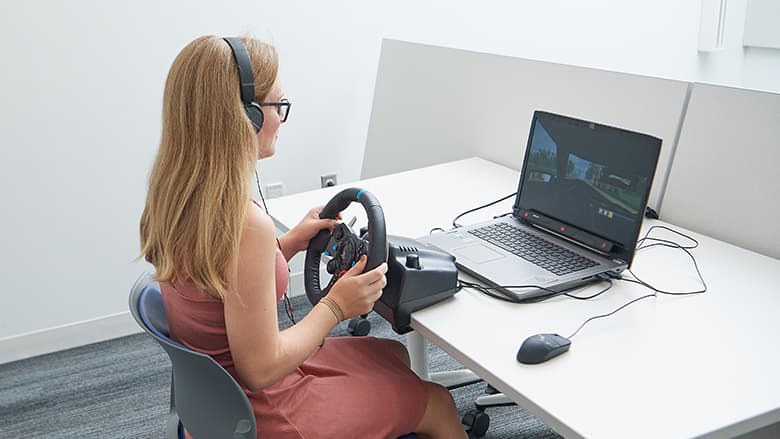 Teen using virtual driving assessment system