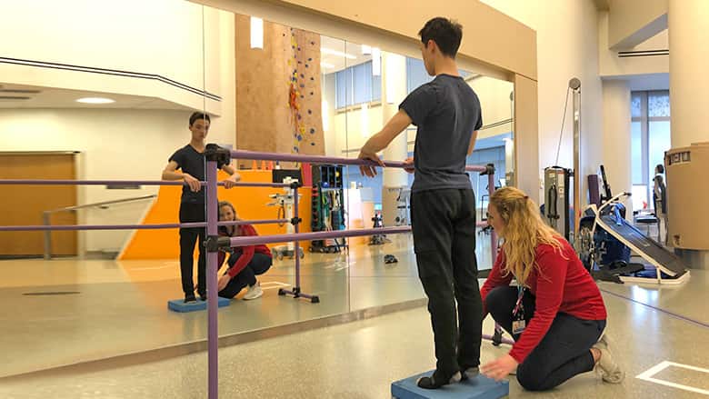 Teen ballet dance doing stretches