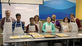 Group photo of kids in the kitchen