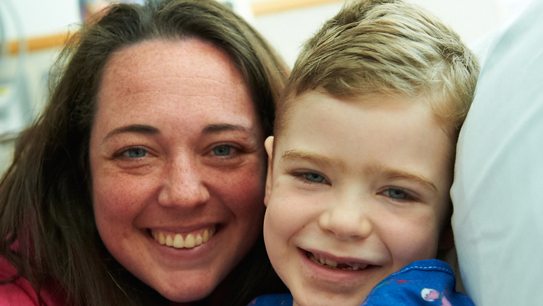 mother and son smiling together