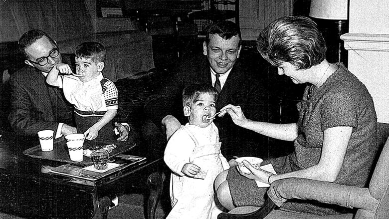 Older photo of Brad Parkes with his younger brother and parents