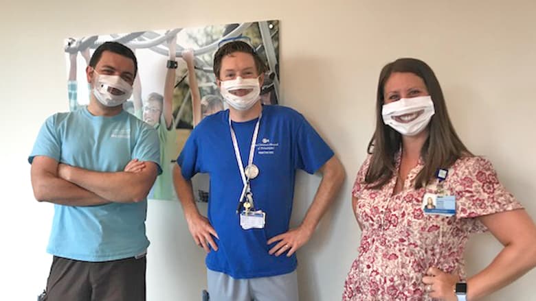 Staff wearing window facemasks