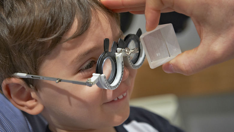 Boy getting eyes checked