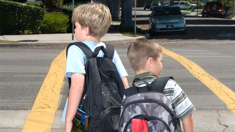 Boys crossing street