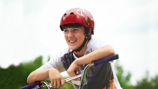 boy wearing bicycle helmet