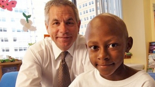 Dr Maris with a cancer patient