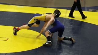 Andrew Luke competing in a wrestling match