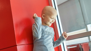 Young cancer patient laughing