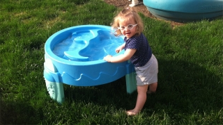 avery playing in pool