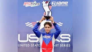 Jacob holding is pro kart trophy
