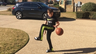 Connor playing basketball