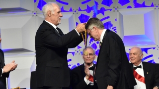 Douglas Wallace receives the Franklin Medal from Don Morel, Chief of the Franklin Institute Board