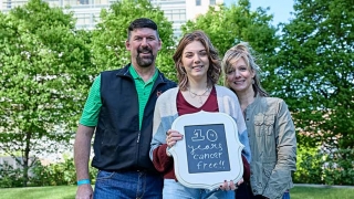 Emily with her parents