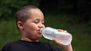 boy with waterbottle
