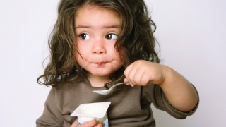 Healthy Weight child eating yogurt