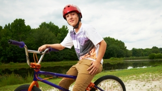 boy with biking helmet