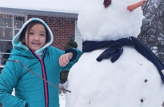 Joslyn with snowman