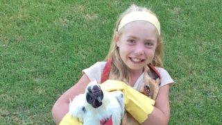Josie holding her pet chicken
