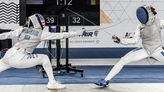 Maia battling an opponent the 2021 Junior World Fencing Championship in Cairo, Egypt.